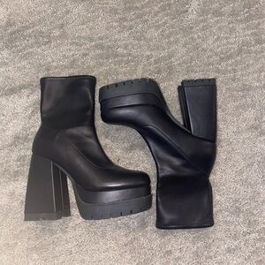 Black platform mid rise heels from call it spring.